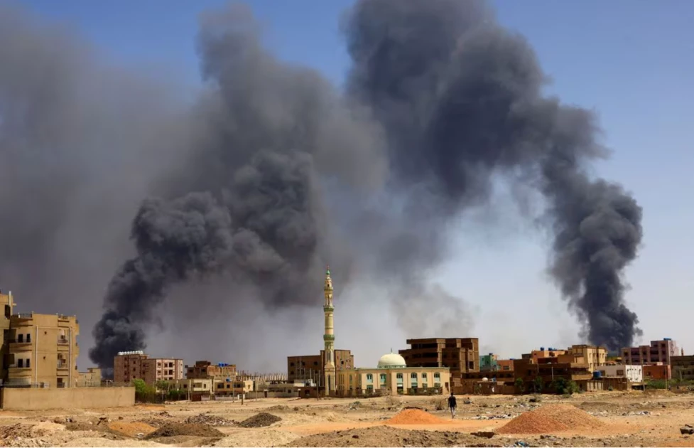 Smoke rises above buildings after aerial bombardment, during clashes between the paramilitary Rapid Support Forces and the army in Khartoum