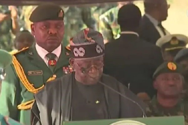 Tinubu at the burial of slain soldiers