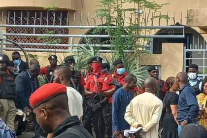 EFCC operatives at the entrance of Yahayaha Bello's residence