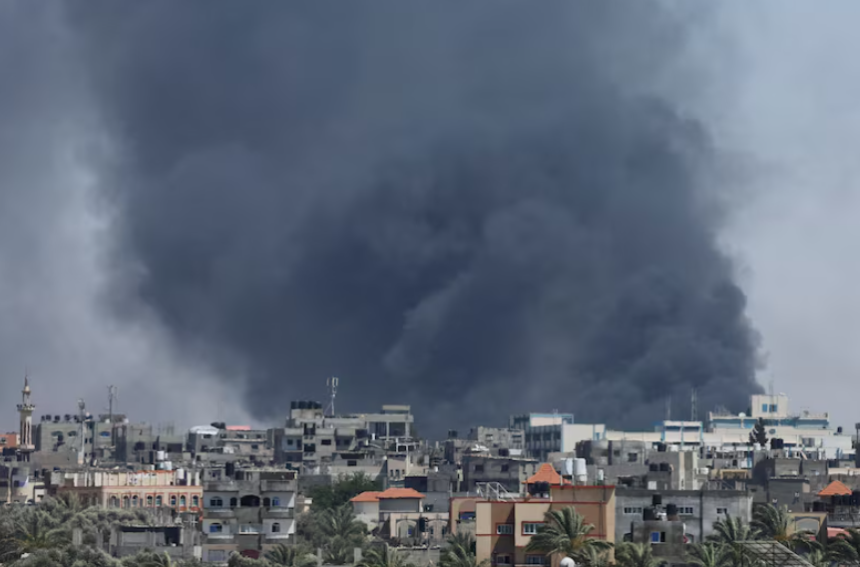 Smoke rises during an Israeli air strike