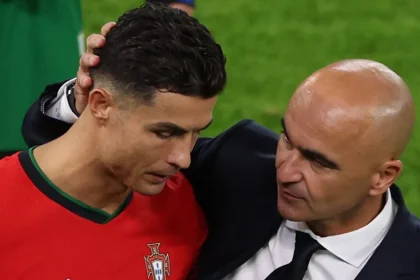 Roberto Martinez consoled a crestfallen Cristiano Ronaldo