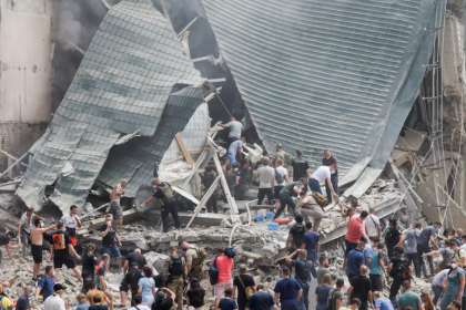 Rescuers work at Ohmatdyt Children's Hospital that was damaged during a Russian missile strikes