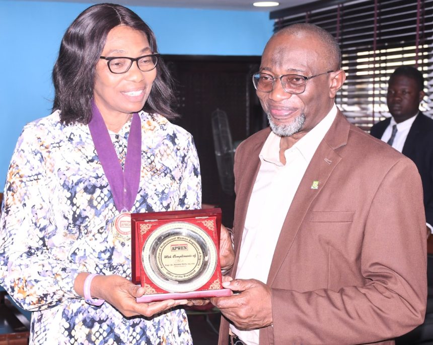 Engr. Dr. Ibraheem Abdul, Rector, Yabatech receiving a presentation of souvenir from the President, Association of Professional Women Engineers of Nigeria (APWEN), Engr. Dr. Adebisi Osini during a courtesy visit paid to the college