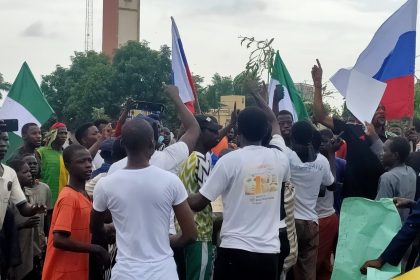 Protesters in Kano flying Russian flags.