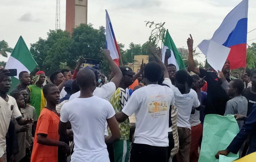 Protesters in Kano flying Russian flags.