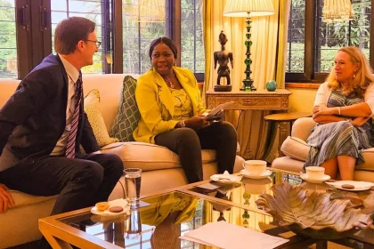 Richard Montgomery (left) with Abike Dabiri-Erewa, NiDCOM chair (middle) during a meeting in Abuja