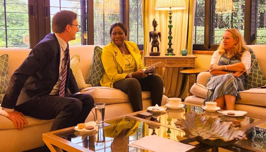 Richard Montgomery (left) with Abike Dabiri-Erewa, NiDCOM chair (middle) during a meeting in Abuja