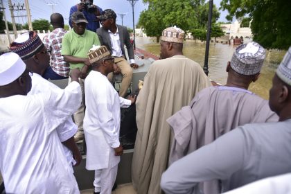 L--R, Ali Ndume, Abdullahi Sule, Aliko Dangote, Babagana Zulum and Sabo Makodo, during the Dangote visit to the flood victims in Maiduguri, Borno State