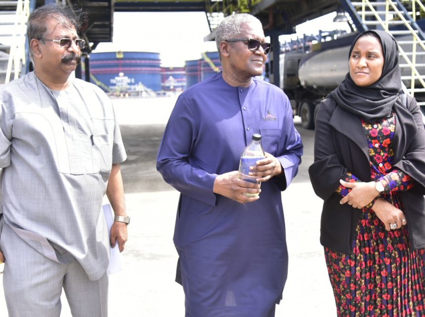 Devakumar Edwin, Aliko Dangote and Fatima Aliko Dangote during the unveiling of the first output of PMS