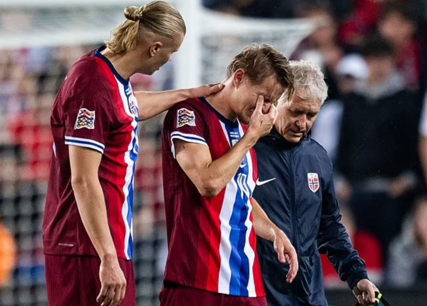 Haaland consoles Odegaard as Arsenal captain limps off after injury