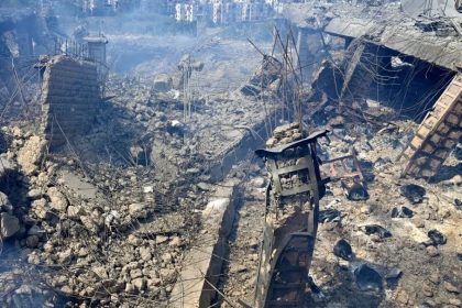 Damaged buildings at the site of an Israeli air strike in Beirut