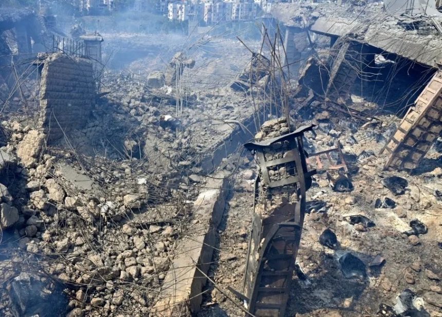 Damaged buildings at the site of an Israeli air strike in Beirut