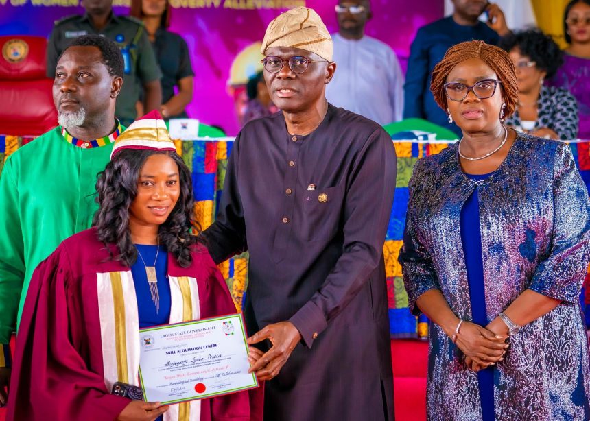 Gov. Sanwo-Olu presenting a Competency Certificate to a graduand