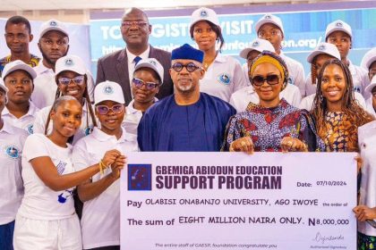 Miss Oyindamola Abiodun; one of the beneficiaries of the Gbemiga Abiodun Education Support Programme, Paramole Kehinde; Gov Dapo Abiodun and others