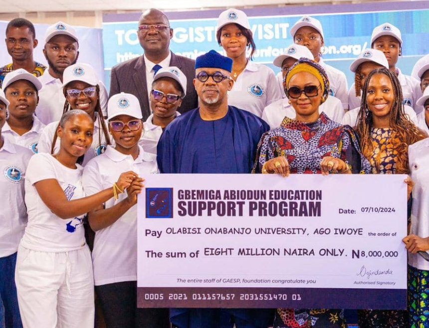 Miss Oyindamola Abiodun; one of the beneficiaries of the Gbemiga Abiodun Education Support Programme, Paramole Kehinde; Gov Dapo Abiodun and others