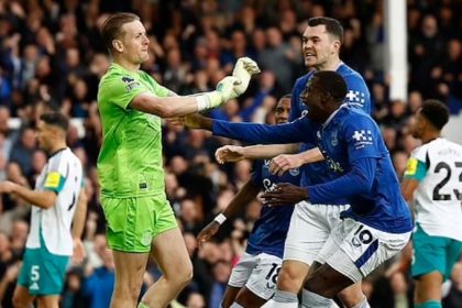 Pickford was congratulated by his Everton team-mates after denying Gordon from the spot