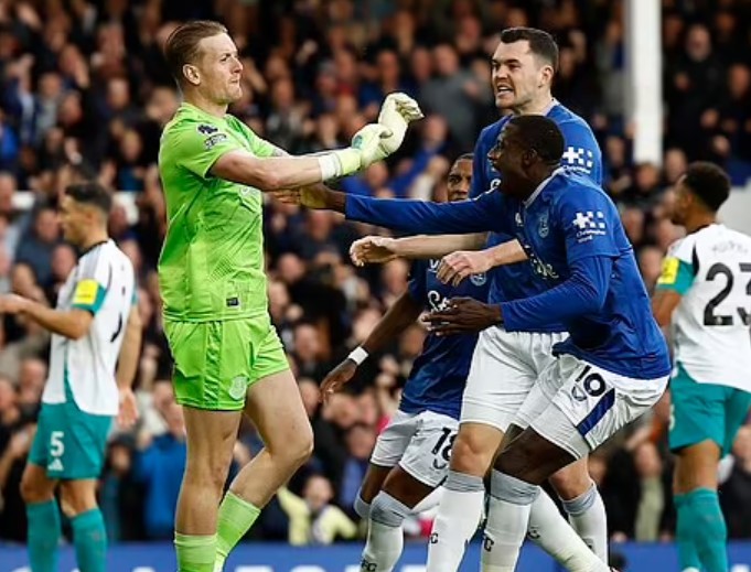 Pickford was congratulated by his Everton team-mates after denying Gordon from the spot