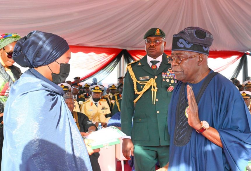 Late Taoreed Lagbaja's widow with President Bola Tinubu